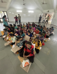 Blind female students in Andh Kanya Shala with their braille booklets and Project Stree menstrual hygiene bags Blind female students in Andh Kanya Shala with their braille booklets and Project Stree menstrual hygiene bags