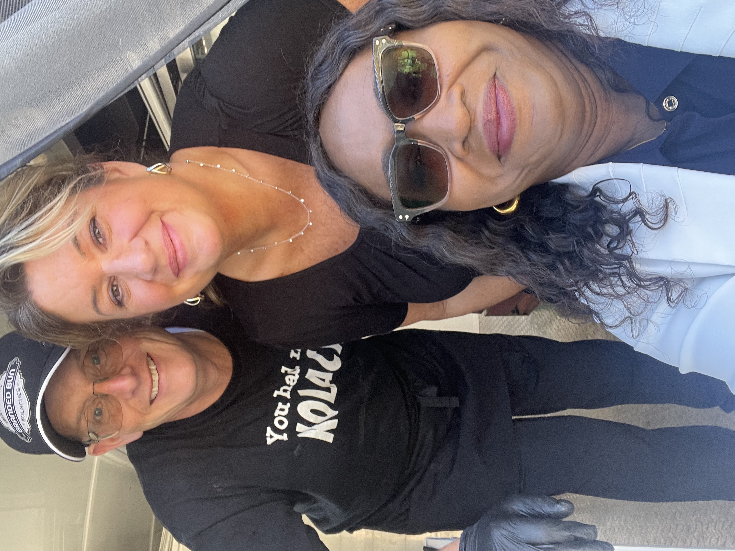 Picture of Business Advisor Gifty Oduro with Bruce and Lynda from inside the truck